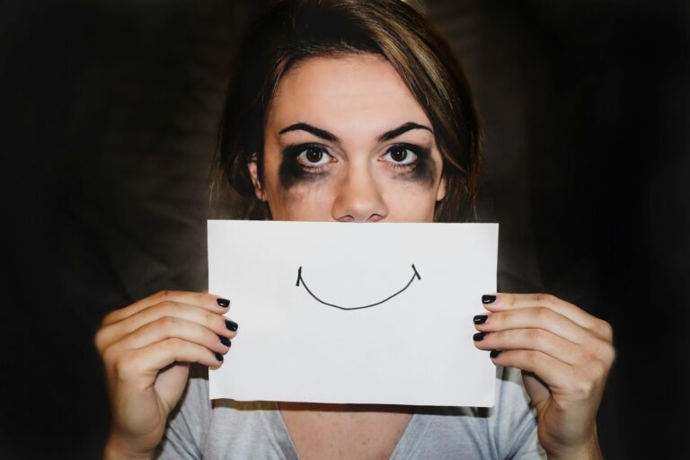 Why High-Performing Marketers Burn Out Faster (And What to Do About It) person holding white printer paper